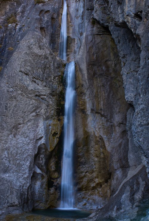 A Rock Formation with Waterfalls