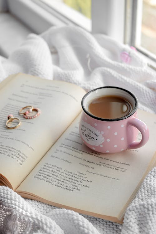 A Cup of Coffee on a Book