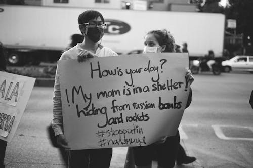 Man and Woman with Banner