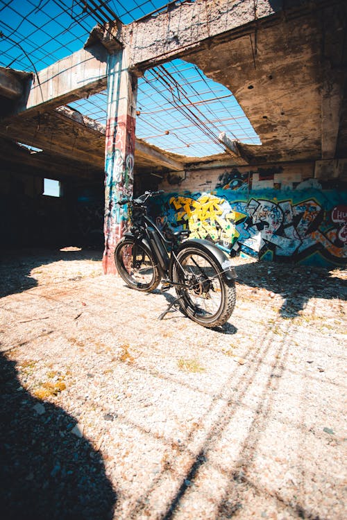 Free A Bicycle in an Abandoned Building Stock Photo