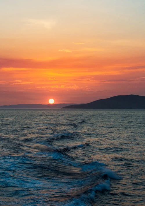 Foto stok gratis laut, lautan, matahari terbenam