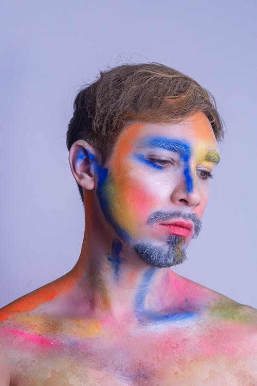 Free Man with Painted Body and Face Stock Photo
