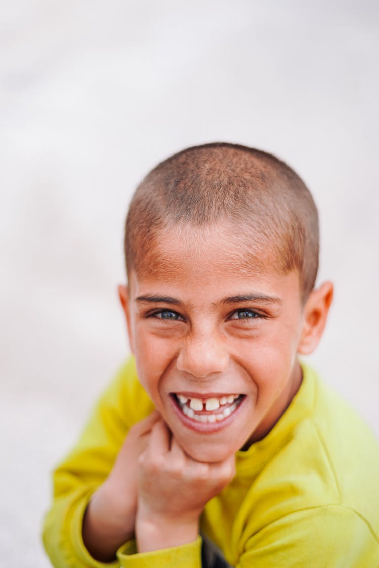 Laughing Boy In Yellow T-Shirt