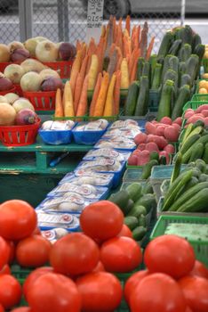 Colorful array of fresh vegetables at an outdoor farmers market stall.. colorful, array, fresh
