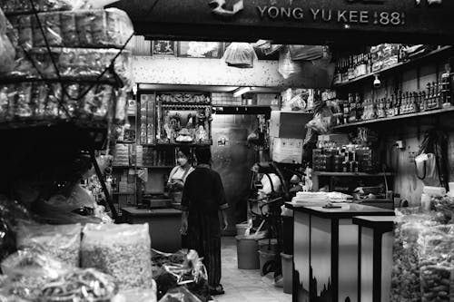 Foto d'estoc gratuïta de blanc i negre, client, comercialitzar