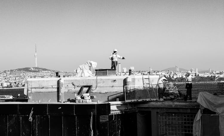 Builders On Construction Site