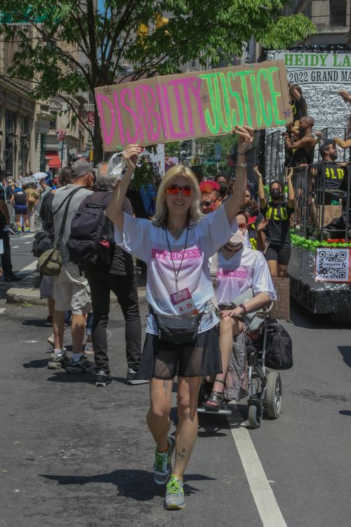 Free Protesters advocate for disability justice during a street parade in New York City. Stock Photo