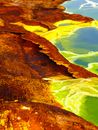 Brown and Green Mountain Beside Body of Water