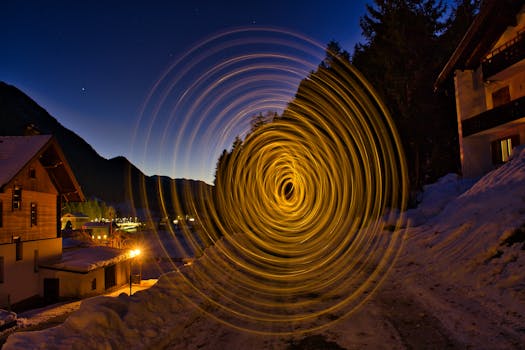 Captivating long exposure showing light trails in winter wonderland of Mittewald, Austria.