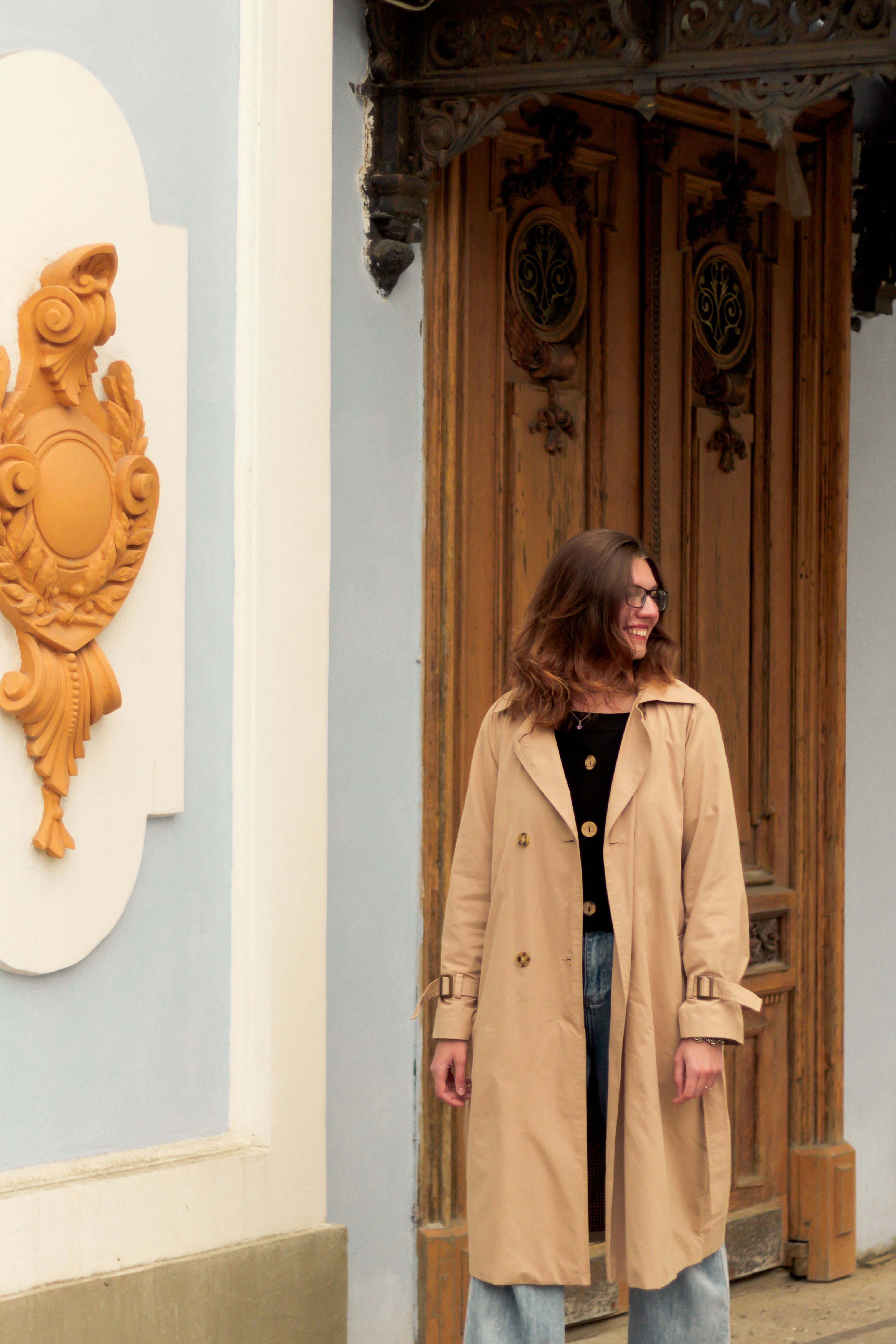 A Woman in Brown Coat Standing · Free Stock Photo