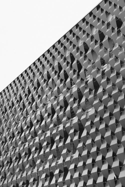 Free Black and white photo of geometric building facade in Kyiv showcasing modern architecture. Stock Photo