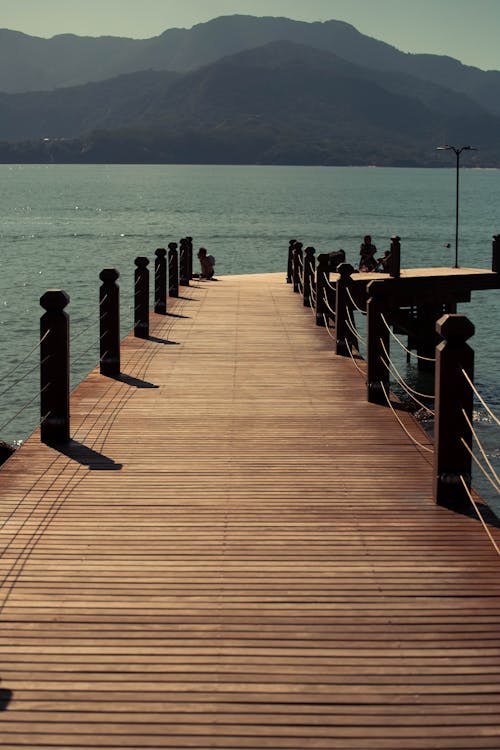 Free Brown Wooden Dock on Sea Stock Photo