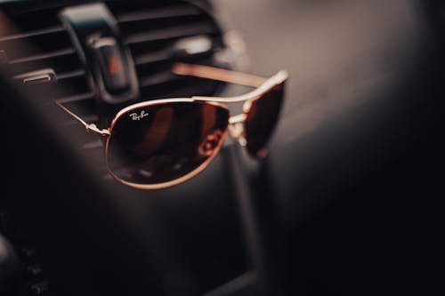 Ray Ban Sunglasses on a Car Vent