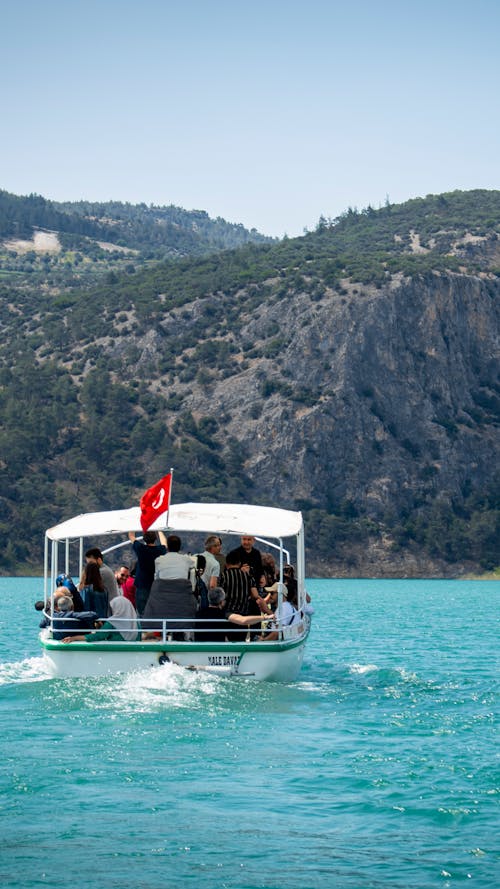 People Riding on a Boat