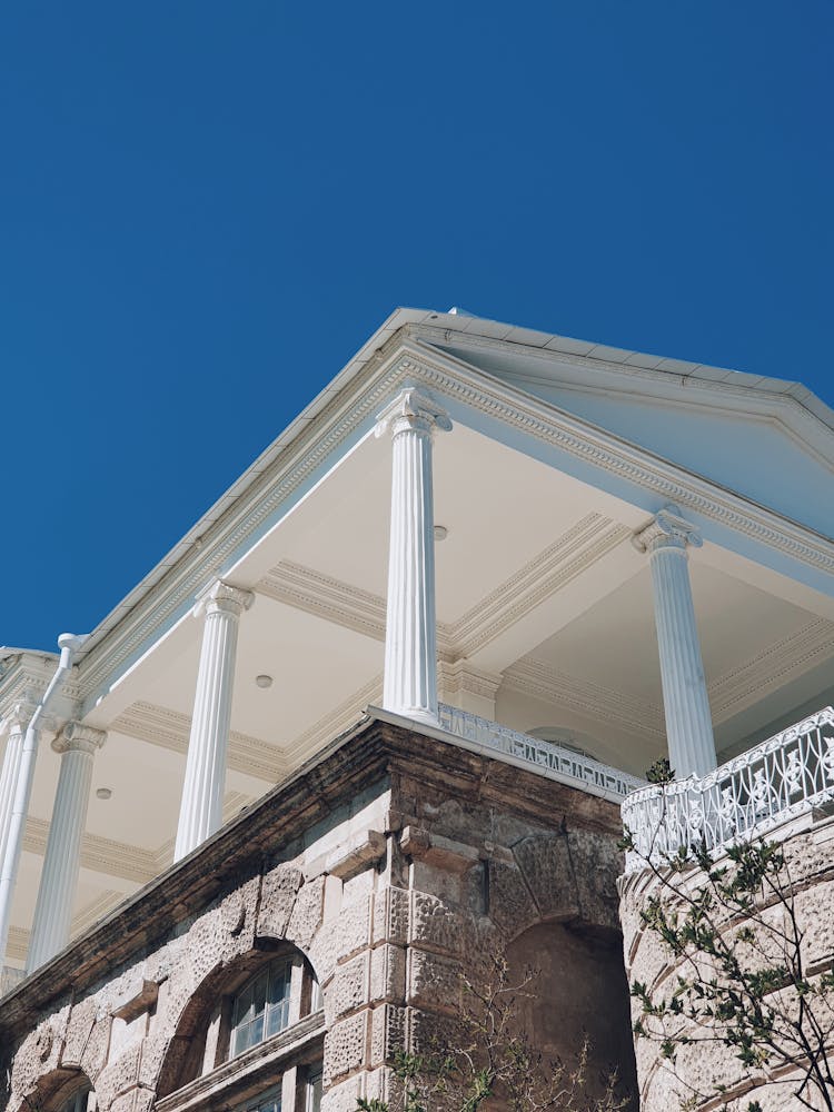 Low Angle Shot Of Eclectic Architecture With Pillars