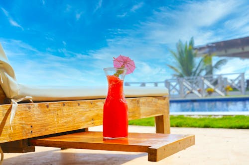 A Red Refreshment in a Glass Pitcher