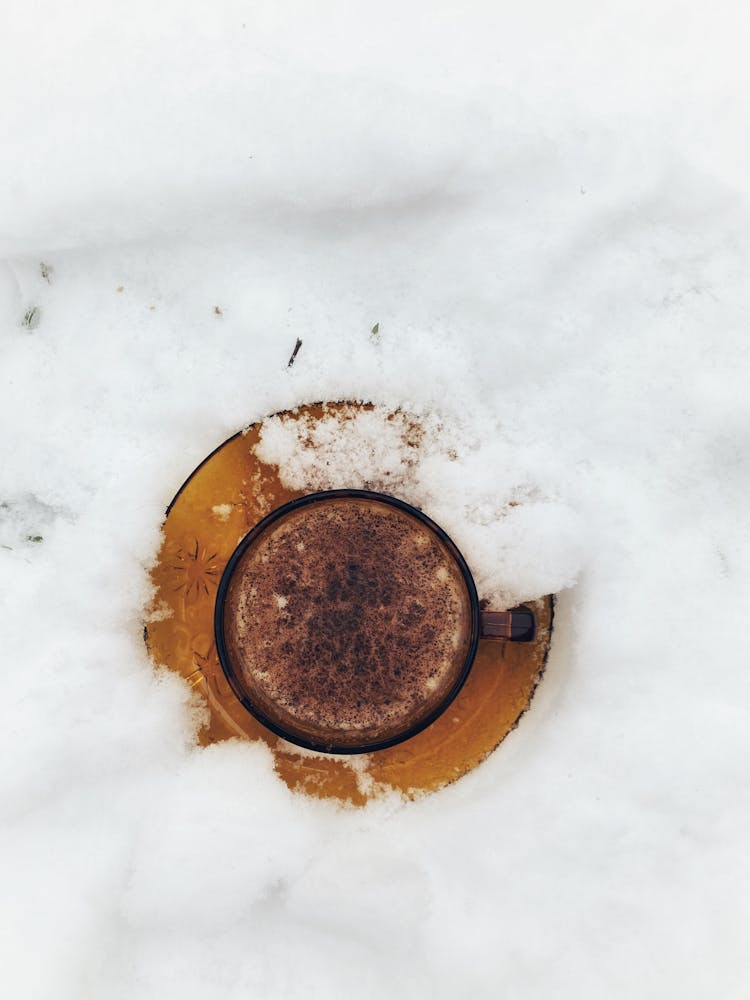 Coffee Cup On Snow