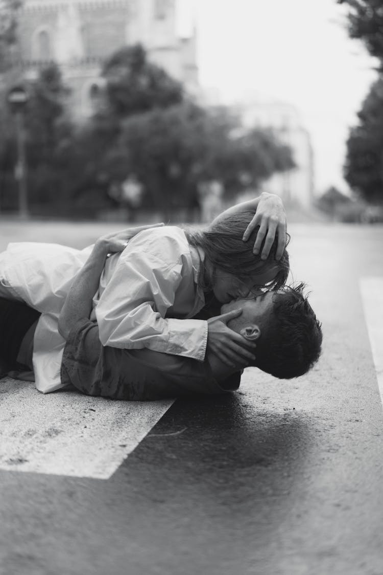 Couple Kissing On Street