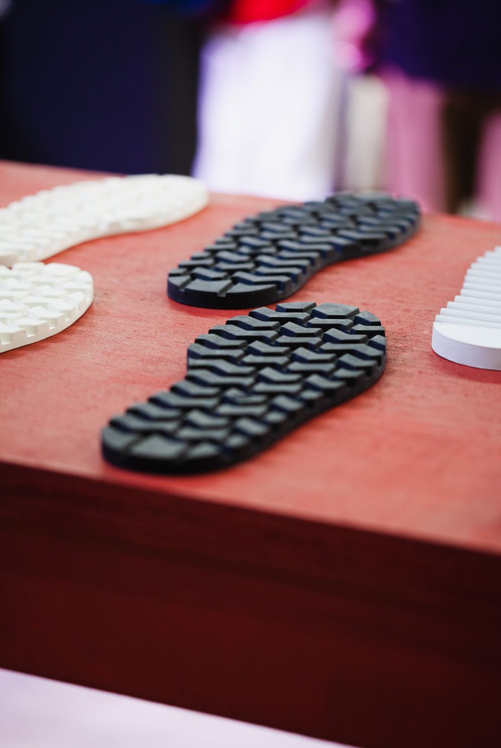 Printed outsoles on the bench — photo by Deybson Mallony on Pexels