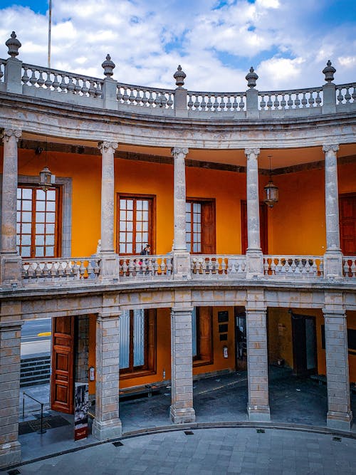 Architectural Structure with Pillars and Orange Walls