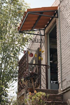 Rustic panaderia entrance with a canopy and metal railings in Cholula, Pue., México.