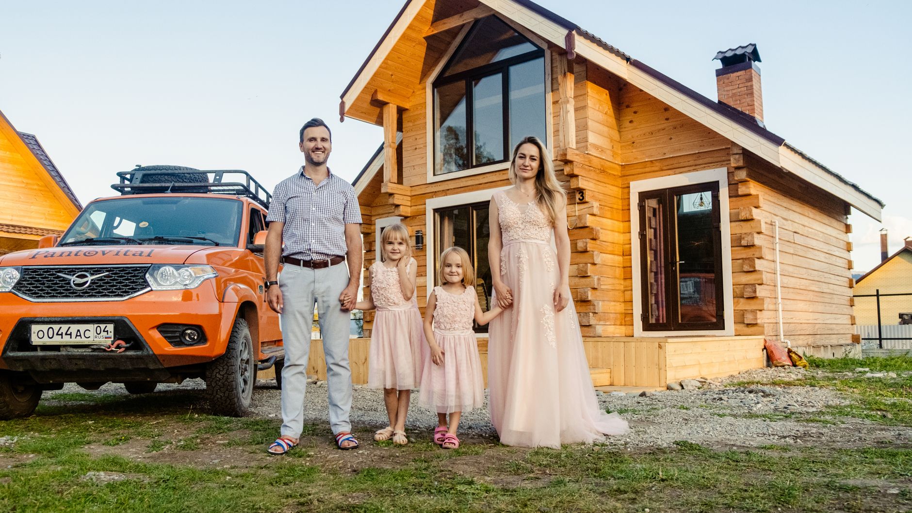 Happy family near home