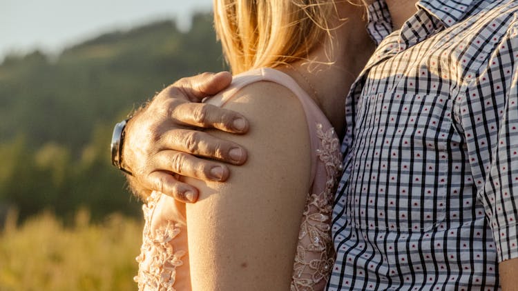 A Couple In A Hugging Pose