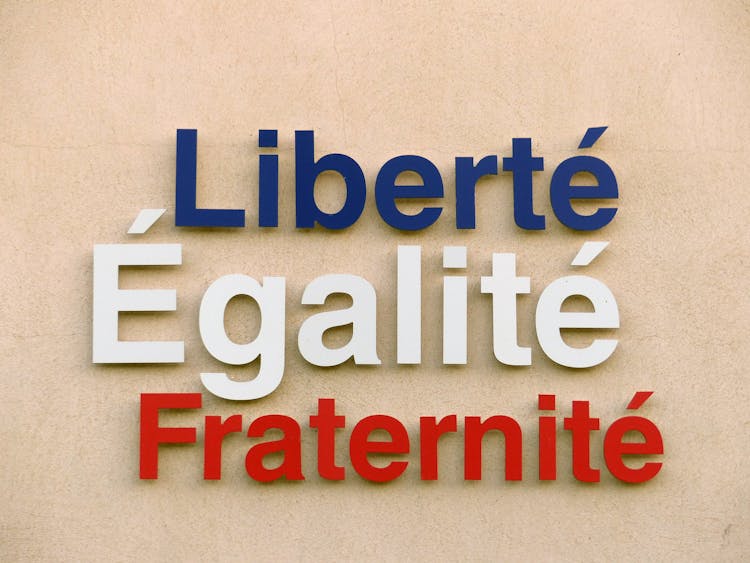 Liberty, Equality And Fraternity Script On A Wall