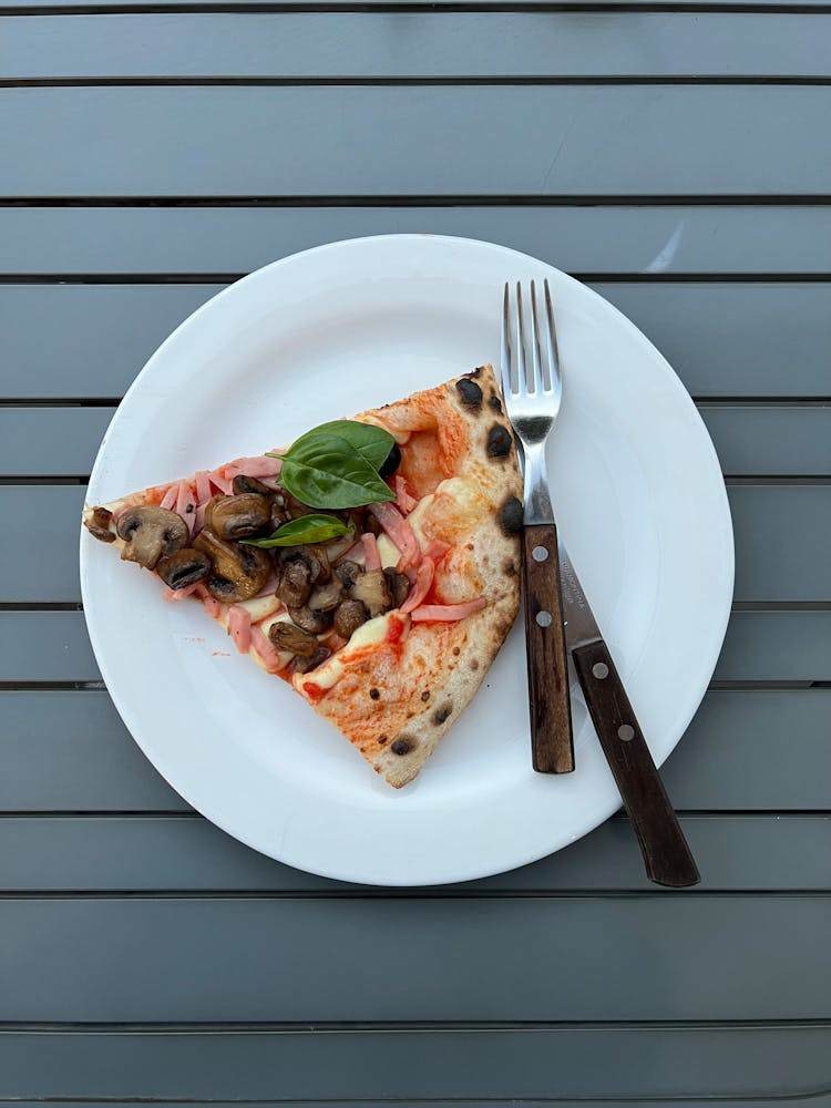 Overhead Shot Of A Pizza On A Plate