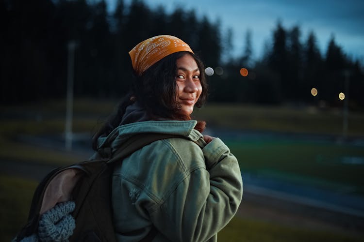 Smiling Woman With Backpack