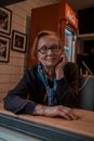 Woman in Black Cardigan Wearing Eyeglasses