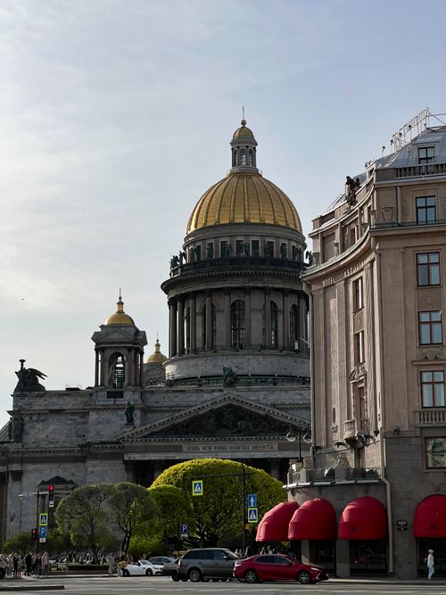 Free View of Saint Isaac's Cathedral and Hotel Astoria in St. Petersburg, Russia, under a clear sky. Stock Photo