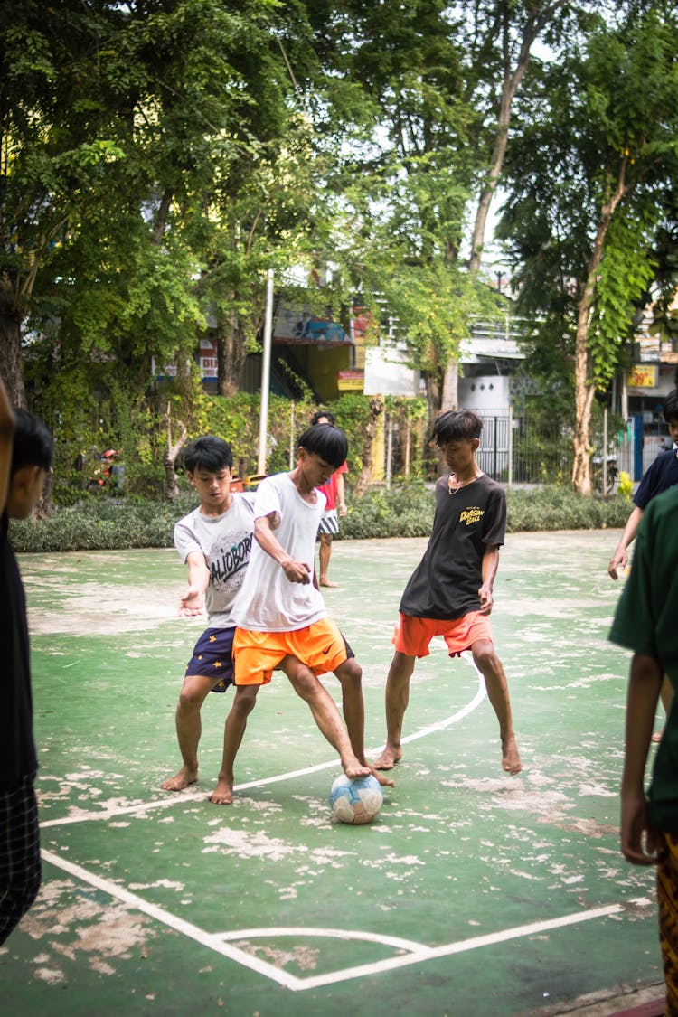 Photograph Of Boys Playing Soccer