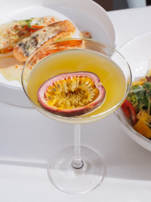 Close-Up Photo of a Drink with Passion Fruit