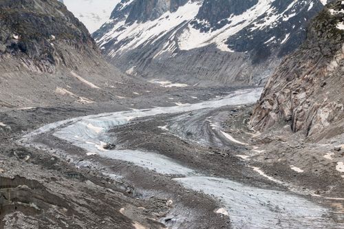 Free A breathtaking view of a rugged, snowy alpine valley in Chamonix, France. Stock Photo