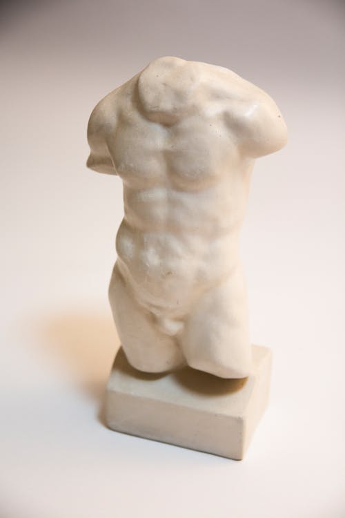 White Stone Statue of Male Torso 