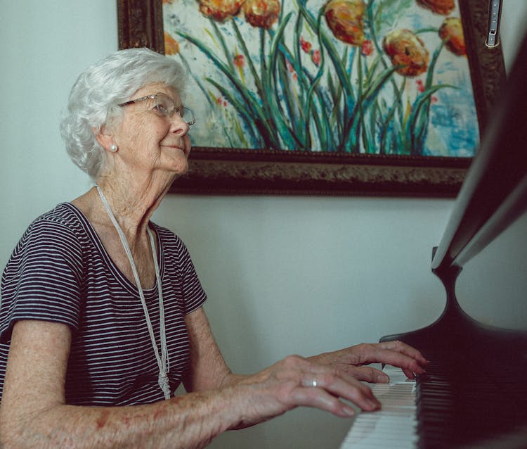 Elderly Woman Playing Piano