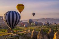 Ballooning over Mountain Landscape
