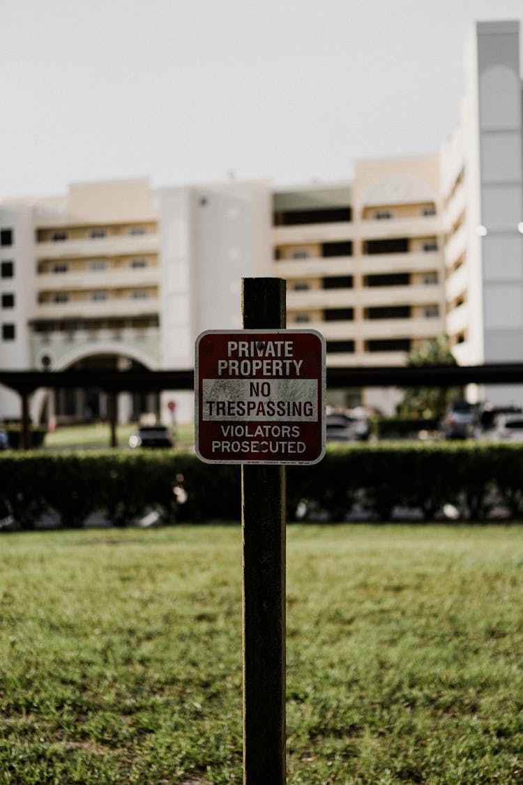 Warning Sign Posted On A Property