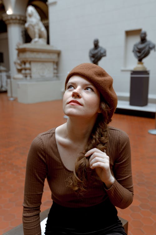 Woman in Hat at Museum