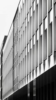 Black and white photo of geometric facade in Nitra, Slovakia highlighting modern architecture.