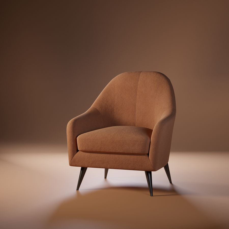 Rust-brown armchair on a warm studio backdrop — photo by Esteban Santiago Gonzalez on Pexels