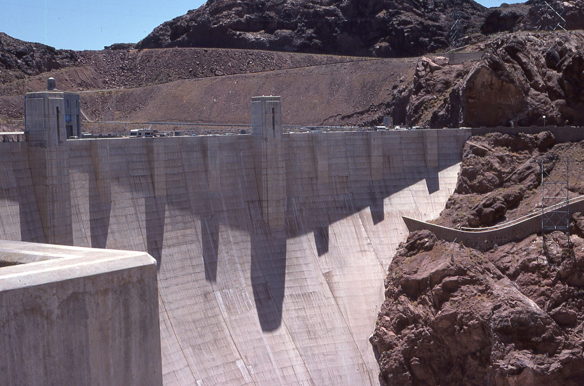 Hoover Dam wall dropping into the Colorado River gorge