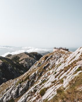 Breathtaking view from the rocky cliffs of Lovćen National Park, Montenegro, showcasing nature's beauty and expansive landscapes.