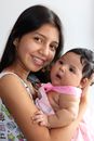 A Girl Carrying a Baby