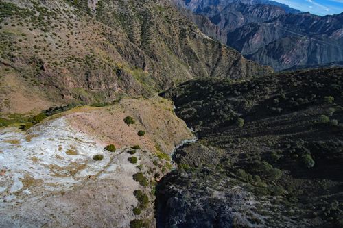 Free Stunning aerial landscape of Copper Canyon in Mexico showcasing rugged mountains and deep valleys. Stock Photo