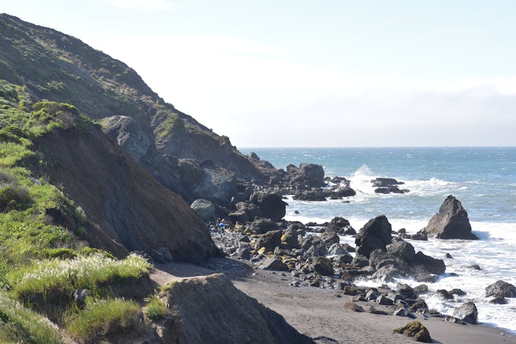 Rocky Shore Near Mountain 