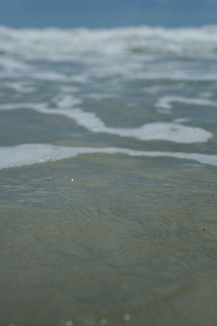 Foam On Sea Water Surface