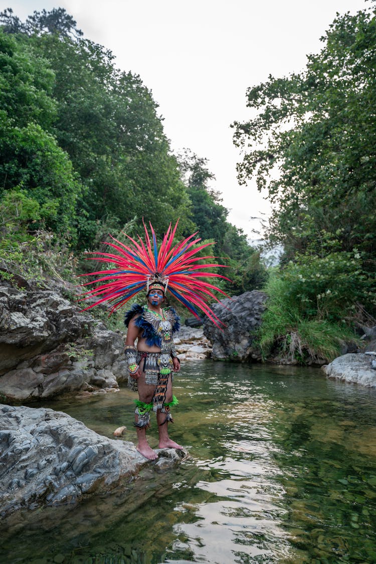 Man In Tribal Feather Headdress