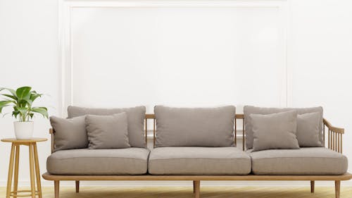 Free Pillows on a Gray Sofa Stock Photo